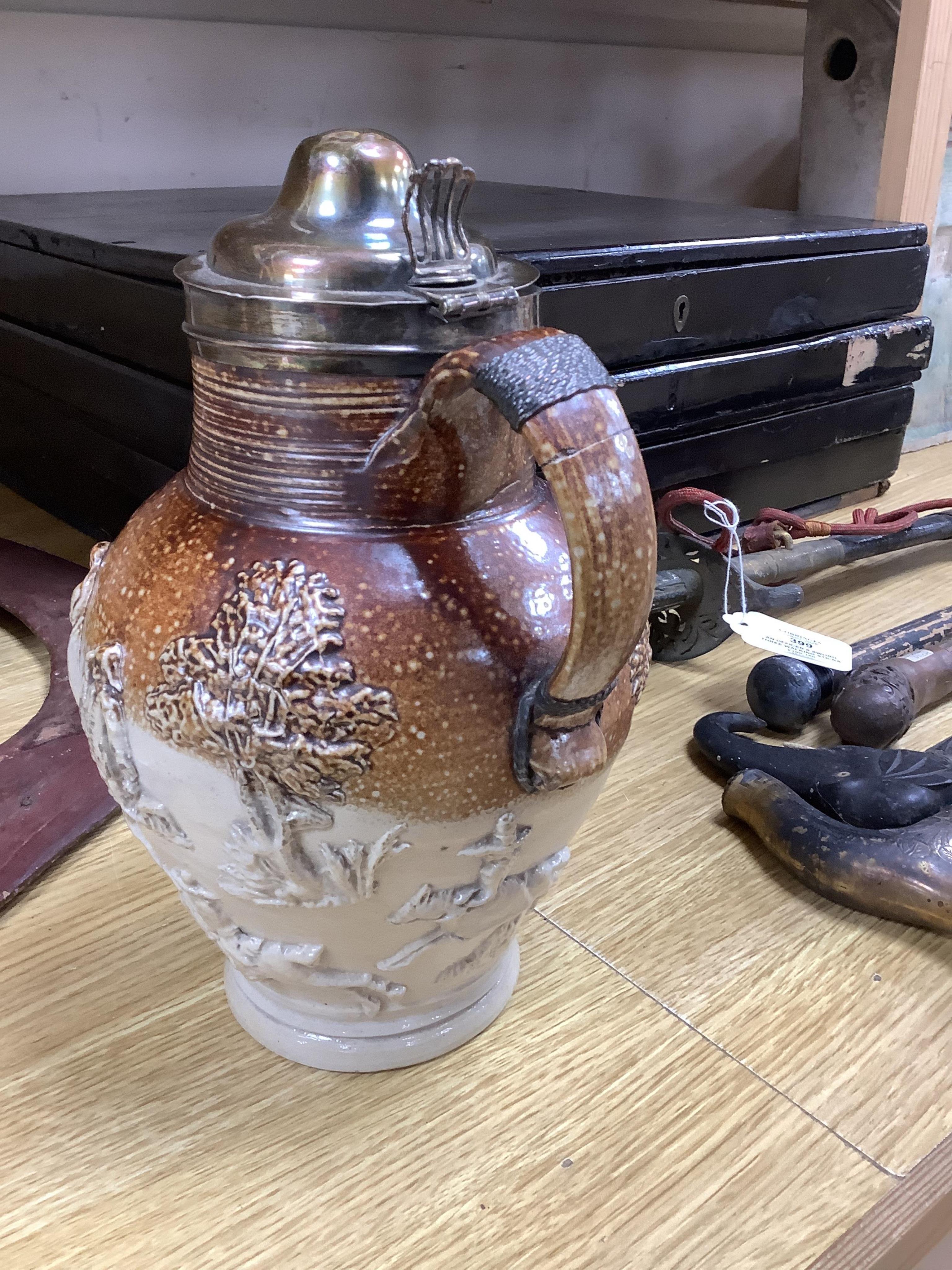A group of Continental ceramics including two late 18th/early 19th century Italian maiolica wet drug jars, a Staffordshire Whieldon type tortoiseshell glazed plate c.1770 and a silver mounted Mortlake stoneware jug, 24cm